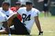 ALAMEDA, CA - MAY 12: Juron Criner #84 of the Oakland Raiders stretches during the Raiders Rookie Minicamp on May 12, 2012 at the Oakland Raiders Training Facility in Alameda, California. (Photo by Thearon W. Henderson/Getty Images)
