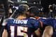 Mario Haggan embracing Tim Tebow