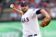 ARLINGTON, TX - MAY 15: Colby Lewis #48 of the Texas Rangers pitches against the Kansas City Royals at Rangers Ballpark in Arlington on May 15, 2012 in Arlington, Texas. (Photo by Layne Murdoch/Getty Images)