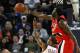 OAKLAND, CA - NOVEMBER 20: Greg Oden #52 of the Portland Trail Blazers blocks a shot by Monta Ellis #8 of the Golden State Warriors during an NBA game at Oracle Arena on November 20, 2009 in Oakland, California. (Photo by Jed Jacobsohn/Getty Images)