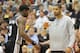 SALT LAKE CITY, UT - MAY 5: Tim Duncan #21 of the San Antonio Spurs greets Stephen Jackson #3 of the San Antonio Spurs as he comes to the bench during the fourth quarter of Game Three of the Western Conference Quarterfinals in the 2012 NBA Playoffs at EnergySolutions Arena on May 05, 2012 in Salt Lake City, Utah. The Spurs won the game 102-90. NOTE TO USER: User expressly acknowledges and agrees that, by downloading and or using this photograph, User is consenting to the terms and conditions of the Getty Images License Agreement. (Photo by Steve Dykes/Getty Images)