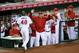 Fired Angels hitting coach Mickey Hatcher greets Torii Hunter.