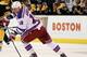 BOSTON, MA - FEBRUARY 14: Marian Gaborik #10 of the New York Rangers takes the puck in the third period against the Boston Bruins on February 14, 2012 at TD Garden in Boston, Massachusetts. The New York Rangers defeated the Boston Bruins 3-0. (Photo by Elsa/Getty Images)