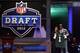 NEW YORK, NY - APRIL 26: Quinton Coples of North Carolina holds up a jersey as he stands on stage with NFL Commissioner Roger Goodell after he was selected #16 overall by the New York Jets in the first round of the 2012 NFL Draft at Radio City Music Hall on April 26, 2012 in New York City. (Photo by Chris Chambers/Getty Images)