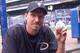 ATLANTA - MAY 19: Randy Johnson of the Arizona Diamondbacks poses with a ball on May 19, 2004 at Turner Field in Atlanta, Georgia. The ball is commemorating his perfect game against the Atlanta Braves on May 18. (Photo by Scott Cunningham/Getty Images)