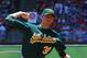 ARLINGTON, TX - MAY 17: Brandon McCarthy #32 of the Oakland Athletics delivers a pitch against the Texas Rangers at Rangers Ballpark in Arlington on May 17, 2012 in Arlington, Texas. (Photo by Rick Yeatts/Getty Images)