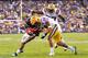 BATON ROUGE, LA - NOVEMBER 20: Tyrann Mathieu #14 of the Louisiana State University Tigers is called for a helmet-to-helmet contact penalty after hitting Korvic Neat #28 of the Ole Miss Rebels at Tiger Stadium on November 20, 2010 in Baton Rouge, Louisiana. (Photo by Kevin C. Cox/Getty Images)