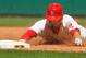 ST. LOUIS, MO - MAY 15: Tyler Greene #27 of the St. Louis Cardinals slides safely into third base after hitting a triple against the Chicago Cubs at Busch Stadium on May 15, 2012 in St. Louis, Missouri. (Photo by Dilip Vishwanat/Getty Images)