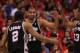 Tim Duncan (center) and the Spurs used a 24-0 run to go up 3-0 on the Clippers.