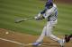 SAN DIEGO, CA - MAY 17: Bobby Abreu #23 of the Los Angeles Dodgers hits a double during the fifth inning of a baseball game against the San Diego Padres at Petco Park on May 17, 2012 in San Diego, California. (Photo by Denis Poroy/Getty Images)