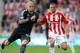 STOKE ON TRENT, ENGLAND - SEPTEMBER 10: Jonathan Walters of Stoke (R) in action with Martin Skrtel of Liverpool during the Barclays Premier League match between Stoke City and Liverpool at Britannia Stadium on September 10, 2011 in Stoke on Trent, England. (Photo by Scott Heavey/Getty Images)
