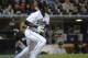 SAN DIEGO, CA - MAY 8: Orlando Hudson #1 of the San Diego Padres hits an RBI triple during the eighth inning of a baseball game against the Colorado Rockies at Petco Park on May 8, 2012 in San Diego, California. (Photo by Denis Poroy/Getty Images)