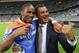 MUNICH, GERMANY - MAY 19: Didier Drogba of Chelsea and former Chelsea manager Ruud Gullit celebrate after their victory in the UEFA Champions League Final between FC Bayern Muenchen and Chelsea at the Fussball Arena München on May 19, 2012 in Munich, Germany. (Photo by Alex Livesey/Getty Images)