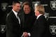 ALAMEDA, CA - JANUARY 30: New Oakland Raiders head coach Dennis Allen (L) greets Raiders general manager Reggie McKenzie (C) and team owner Mark Davis during a press conference on January 30, 2012 in Alameda, California. Dennis Allen was introduced as the new coach of the Oakland Raiders, replacing Hue Jackson who was fired after one season. (Photo by Justin Sullivan/Getty Images)