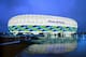 MUNICH, GERMANY - UNDATED: (EDITORIAL USE ONLY - NO COMMERCIALS) In
this handout image from the Allianz Group, the Allianz Arena is illuminated with white, green and blue lights ahead of the UEFA Champions League Final between FC Bayern Munich and Chelsea. The final takes place at the Allianz Arena on May 19, 2012. (Photo by Allianz Group via Getty Images)