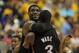 INDIANAPOLIS, IN - MAY 20: LeBron James #6 of the Miami Heat hugs teammate Dwyane Wade #3 near the end of a win over the Indiana Pacers in Game Four of the Eastern Conference Semifinals in the 2012 NBA Playoffs at Bankers Life Fieldhouse on May 20, 2012 in Indianapolis, Indiana. The Heat defeated the Pacers 101-93. NOTE TO USER: User expressly acknowledges and agrees that, by downloading and/or using this photograph, User is consenting to the terms and conditions of the Getty Images License Agreement. (Photo by Jonathan Daniel/Getty Images)