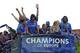 LONDON, ENGLAND - MAY 20: Roman Abramovich and the Chelsea team celebrate from an open top bus during the Chelsea victory parade following their UEFA Champions League and FA Cup victories on May 20, 2012 in London, England. (Photo by Steve Bardens/Getty Images)