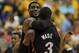 INDIANAPOLIS, IN - MAY 20: LeBron James #6 of the Miami Heat hugs teammate Dwyane Wade #3 near the end of a win over the Indiana Pacers in Game Four of the Eastern Conference Semifinals in the 2012 NBA Playoffs at Bankers Life Fieldhouse on May 20, 2012 in Indianapolis, Indiana. The Heat defeated the Pacers 101-93. NOTE TO USER: User expressly acknowledges and agrees that, by downloading and/or using this photograph, User is consenting to the terms and conditions of the Getty Images License Agreement. (Photo by Jonathan Daniel/Getty Images)