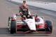 INDIANAPOLIS, IN - MAY 20: Ryan Briscoe the pole sitter for the Indianpolis 500 and driver of the IZOD Team Penske car poses on the track at Indianapolis Motor Speedway on May 20, 2012 in Indianapolis, Indiana. (Photo by Andy Lyons/Getty Images)