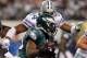 ARLINGTON, TX - DECEMBER 24: LeSean McCoy #25 of the Philadelphia Eagles carries the ball against DeMarcus Ware #94 of the Dallas Cowboys at Cowboys Stadium on December 24, 2011 in Arlington, Texas. (Photo by Tom Pennington/Getty Images)