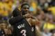 INDIANAPOLIS, IN - MAY 20: LeBron James #6 of the Miami Heat hugs teammate Dwyane Wade #3 near the end of a win over the Indiana Pacers in Game Four of the Eastern Conference Semifinals in the 2012 NBA Playoffs at Bankers Life Fieldhouse on May 20, 2012 in Indianapolis, Indiana. The Heat defeated the Pacers 101-93. NOTE TO USER: User expressly acknowledges and agrees that, by downloading and/or using this photograph, User is consenting to the terms and conditions of the Getty Images License Agreement. (Photo by Jonathan Daniel/Getty Images)