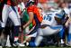 DENVER, CO - OCTOBER 30: Linebacker Stephen Tulloch #55 of the Detroit Lions reacts by 'Tebowing' after making a sack on quarterback Tim Tebow #15 of the Denver Broncos during the first quarter at Sports Authority Field at Mile High on October 30, 2011 in Denver, Colorado. (Photo by Justin Edmonds/Getty Images)