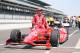 INDIANAPOLIS, IN - MAY 19: Dario Franchitti the driver of the #50 Target Chip Ganassi Racing car poses with the car following his qualifying run for the Indianapolis 500 at Indianapolis Motor Speedway on May 19, 2012 in Indianapolis, Indiana. (Photo by Andy Lyons/Getty Images)