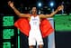 PHOENIX - FEBRUARY 14: Dwight Howard of the Orlando Magic emerges from a phone booth wearing a Superman cape during the Sprite Slam Dunk Contest on All-Star Saturday Night, part of 2009 NBA All-Star Weekend at US Airways Center on February 14, 2009 in Phoenix, Arizona. NOTE TO USER: User expressly acknowledges and agrees that, by downloading and or using this photograph, User is consenting to the terms and conditions of the Getty Images License Agreement. (Photo by Ronald Martinez/Getty Images)