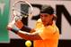 ROME, ITALY - MAY 21: Rafael Nadal plays a backhand against Novak Djokovic of Serbia in their final match during day ten of the Internazionali BNL d'Italia 2012 at the Foro Italico Tennis Centre on May 21, 2012 in Rome, Italy. (Photo by Clive Brunskill/Getty Images)