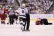 GLENDALE, AZ - MAY 22: Dustin Brown #23 of the Los Angeles Kings reacts alongside a referee after Brown checked Michal Rozsival #32 of the Phoenix Coyotes in overtime of Game Five of the Western Conference Final during the 2012 NHL Stanley Cup Playoffs at Jobing.com Arena on May 22, 2012 in Phoenix, Arizona. (Photo by Jeff Gross/Getty Images)