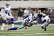 ARLINGTON, TX - OCTOBER 23: Cornerback Mike Jenkins #21of the Dallas Cowboys intercepts a pass against Brandon Lloyd #83 of the St. Louis Rams at Cowboys Stadium on October 23, 2011 in Arlington, Texas. (Photo by Layne Murdoch/Getty Images)