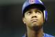 Starlin Castro wonders how he'll look with a golden sombrero, after striking out four times. (Brett Davis-US PRESSWIRE)