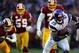 LANDOVER, MD - DECEMBER 24: Running back Adrian Peterson #28 of the Minnesota Vikings rushes for yards against the Washington Redskins in the second quarter at FedEx Field on December 24, 2011 in Landover, Maryland. The Minnesota Vikings won, 33-26. (Photo by Patrick Smith/Getty Images)