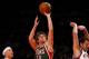 NEW YORK, NY - MARCH 26: Beno Udrih #19 of the Milwaukee Bucks drives for a shot attempt against Mike Bibby #20 and Josh Harrellson #55 of the New York Knicks at Madison Square Garden on March 26, 2012 in New York City. NOTE TO USER: User expressly acknowledges and agrees that, by downloading and or using this photograph, User is consenting to the terms and conditions of the Getty Images License Agreement. (Photo by Chris Chambers/Getty Images)