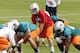 DAVIE, FL - MAY 4: Ryan Tannehill #17 takes a snap from Terrence Brown #60 of the Miami Dolphins during the rookie minicamp on May 4, 2012 at the Miami Dolphins training facility in Davie, Florida. (Photo by Joel Auerbach/Getty Images)