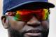 BALTIMORE, MD - MAY 22: David Ortiz #34 of the Boston Red Sox talks with a teammate while waiting to take batting practice before the start of the Red Sox and Baltimore Orioles game at Oriole Park at Camden Yards on May 22, 2012 in Baltimore, Maryland. (Photo by Rob Carr/Getty Images)
