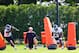 PHILADELPHIA, PA - MAY 12: Twyon Martin #77 and Fletcher Cox #91 of the Philadelphia Eagles blast through the blocking dummies as defensive line coach Jim Washburn, canter, looks on during rookie minicamp at their practice facility on May 12, 2012 in Philadelphia, Pennsylvania. (Photo by Rich Schultz/Getty Images)