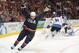 Zach Parise scores a goal in the semifinal against Finland in the 2010 Olympics.