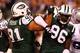 EAST RUTHERFORD, NJ - SEPTEMBER 11: (L-R) Sione Pouha #91 and Muhammad Wilkerson #96 of the New York Jets celebrate after the Jets recorded a sack against the Dallas Cowboys during their NFL Season Opening Game at MetLife Stadium on September 11, 2011 in East Rutherford, New Jersey. (Photo by Jeff Zelevansky/Getty Images)
