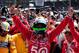 INDIANAPOLIS, IN - MAY 27: Dario Franchitti of Scotland, driver of the #50 Target Chip Ganassi Racing Honda, celebrates as he climbs out of his car in victory lane after winning the IZOD IndyCar Series 96th running of the Indianapolis 500 mile race at the Indianapolis Motor Speedway on May 27, 2012 in Indianapolis, Indiana. (Photo by Robert Laberge/Getty Images)