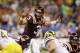 NEW ORLEANS, LA - JANUARY 03: Logan Thomas #3 of the Virginia Tech Hokies gestures as he calls signals out behind the line of scrimmage against the Michigan Wolverines during the Allstate Sugar Bowl at Mercedes-Benz Superdome on January 3, 2012 in New Orleans, Louisiana. (Photo by Matthew Stockman/Getty Images)