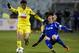 KHIMKI, RUSSIA - MARCH 05: Andriy Voronin (R) of FC Dynamo Moscow battles for the ball with Odil Ahmedov of FC Anzhi Makhachkala during the Russian Football League Championship match between FC Dynamo Moscow and FC Anzhi Makhachkala at the Arena Khimki Stadium on March 05, 2012 in Khimki, Russia. (Photo by Dmitry Korotayev/Epsilon/Getty Images)