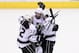GLENDALE, AZ - MAY 15: Drew Doughty #8 of the Los Angeles Kings (C)) celebrates with Jarret Stoll #28 and Trevor Lewis #22 after Doughty's shot was deflected in for a goal by teammate Dwight King #74 (not in photo) against the Phoenix Coyotes in the first period of Game Two of the Western Conference Final during the 2012 NHL Stanley Cup Playoffs at Jobing.com Arena on May 15, 2012 in Phoenix, Arizona. (Photo by Jeff Gross/Getty Images)