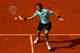 PARIS, FRANCE - MAY 27: Nicolas Mahut of France plays a forehand in his men's singles first round match against Andy Roddick of USA during day one of the French Open at Roland Garros on May 27, 2012 in Paris, France. (Photo by Matthew Stockman/Getty Images)