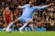 LIVERPOOL, ENGLAND - JANUARY 25: Nigel de Jong of Manchester City scores the opening goal during the Carling Cup Semi Final Second Leg match between Liverpool and Manchester City at Anfield on January 25, 2012 in Liverpool, England. (Photo by Michael Regan/Getty Images)