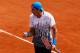 PARIS, FRANCE - MAY 24: John Isner of USA celebrates a point during the men's singles round one match between Rafael Nadal of Spain and John Isner of USA on day three of the French Open at Roland Garros on May 24, 2011 in Paris, France. (Photo by Matthew Stockman/Getty Images)
