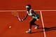 PARIS, FRANCE - MAY 29: Serena Williams of USA plays a forehand in her women's singles first round match between Serena Williams of USA and Virginie Razzano of France during day three of the French Open at Roland Garros on May 29, 2012 in Paris, France. (Photo by Mike Hewitt/Getty Images)