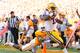 KNOXVILLE, TN - OCTOBER 15: Spencer Ware #11 of the LSU Tigers scores a touchdown against Brian Randolph #37 of the Tennessee Volunteers at Neyland Stadium on October 15, 2011 in Knoxville, Tennessee. (Photo by Kevin C. Cox/Getty Images)