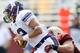 CHESTNUT HILL, MA - SEPTEMBER 03: Kain Colter #2 of the Northwestern Wildcats scrambes as Max Holloway #56 of the Boston College Eagles pressures on September 3, 2011 at Alumni Stadium in Chestnut Hill, Massachusetts.The Northwestern Wildcats defeated the Boston College Eagles 24-17. (Photo by Elsa/Getty Images)