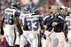 GLENDALE, AZ - JANUARY 01: Head coach Pete Carroll of the Seattle Seahawks congratulates Leon Washington #33 after scoring a touchdown during the NFL game against the Arizona Cardinals at the University of Phoenix Stadium on January 1, 2012 in Glendale, Arizona. The Cardinals defeated the Seahawks 23-20 in overtime. (Photo by Christian Petersen/Getty Images)